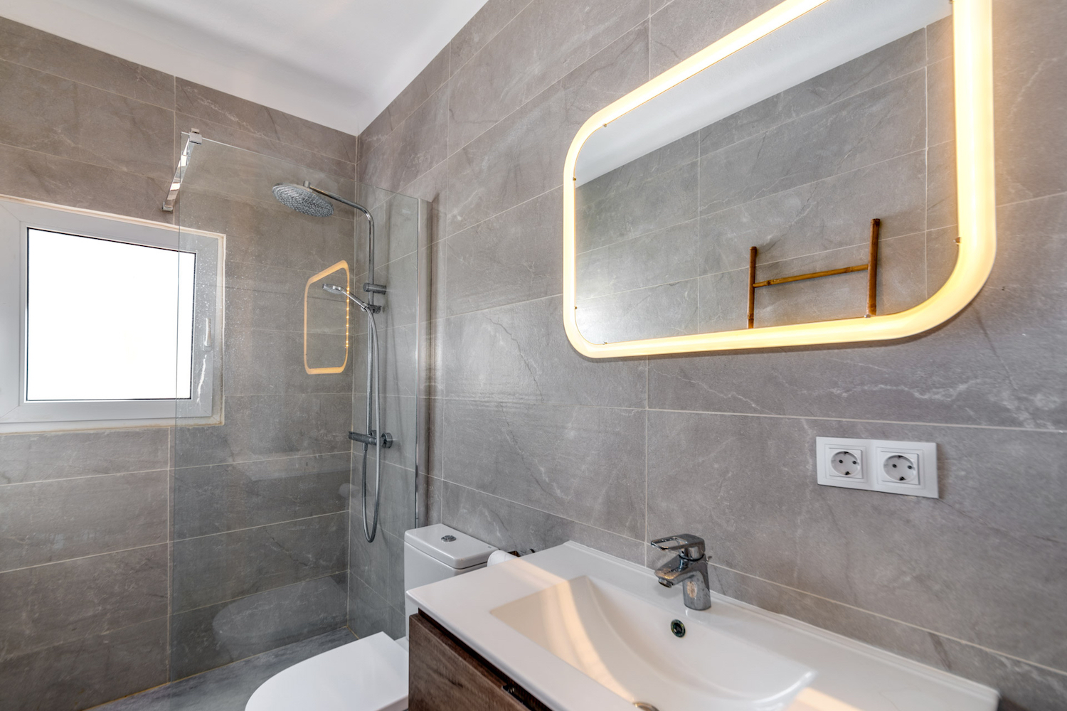 One of 3 bathrooms
