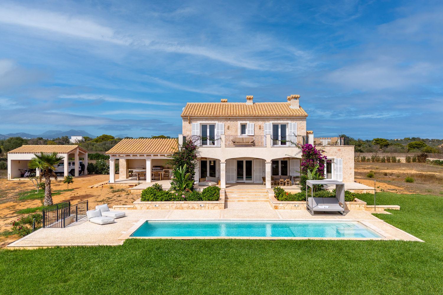 Modern natural stone finca with pool and sea views