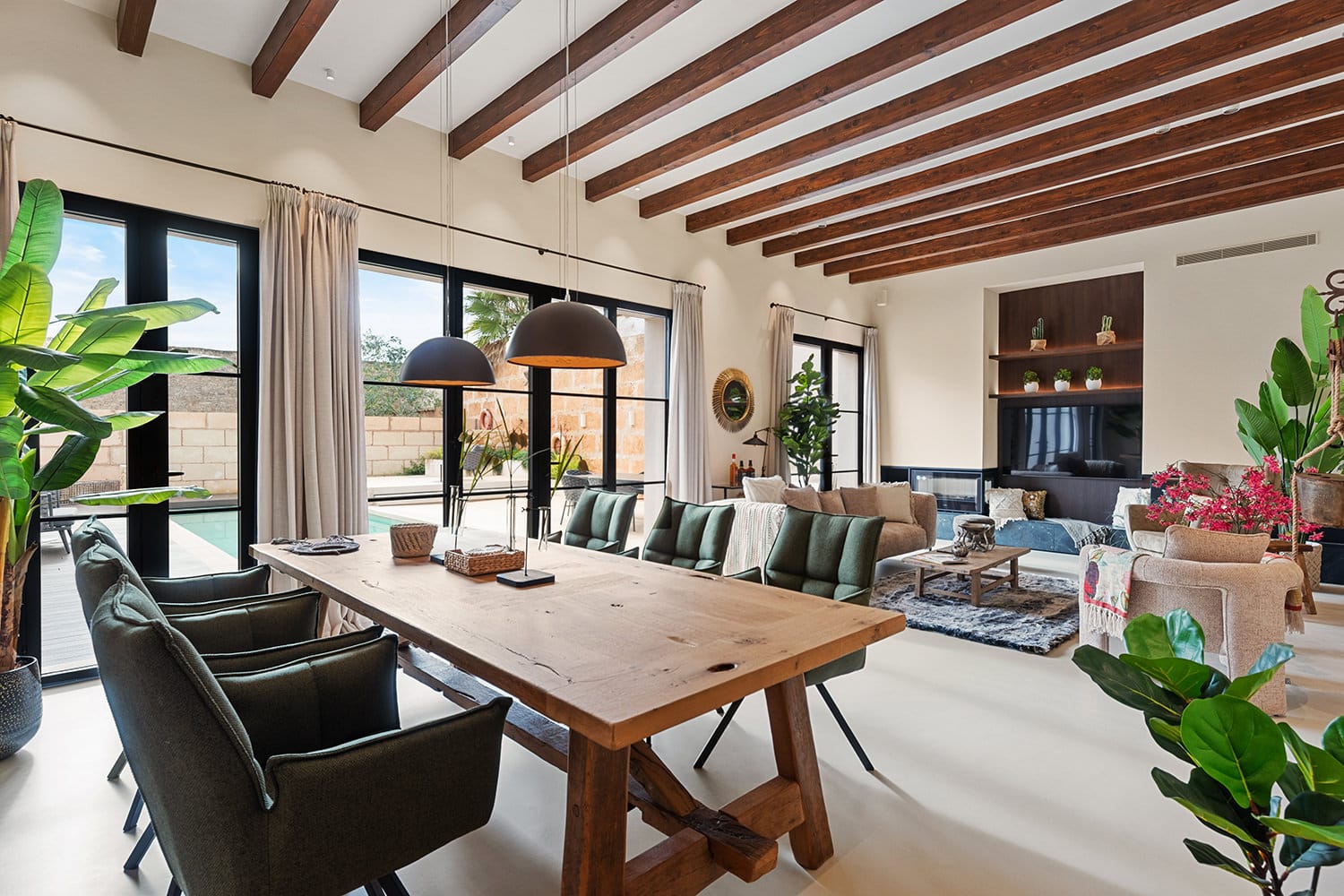 Open living and dining area with fireplace