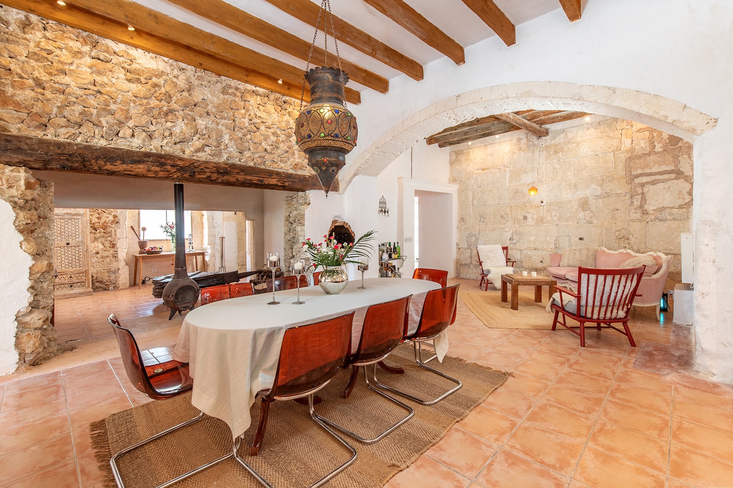 Open living and dining area with fireplace