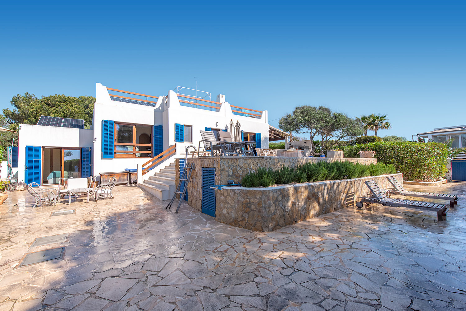 Mediterranean villa with expansive terraces and pool area