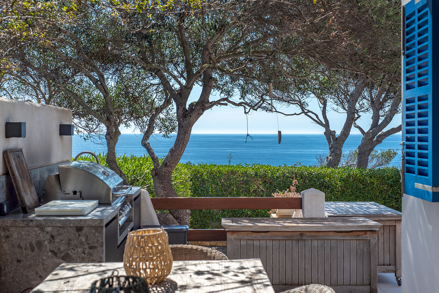 Outdoor kitchen with BBQ area and spectacular sea views