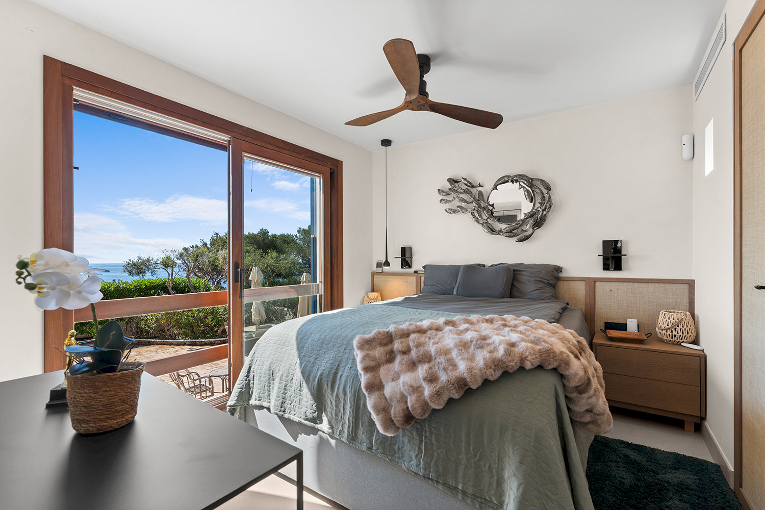 Comfortable bedroom with direct sea views