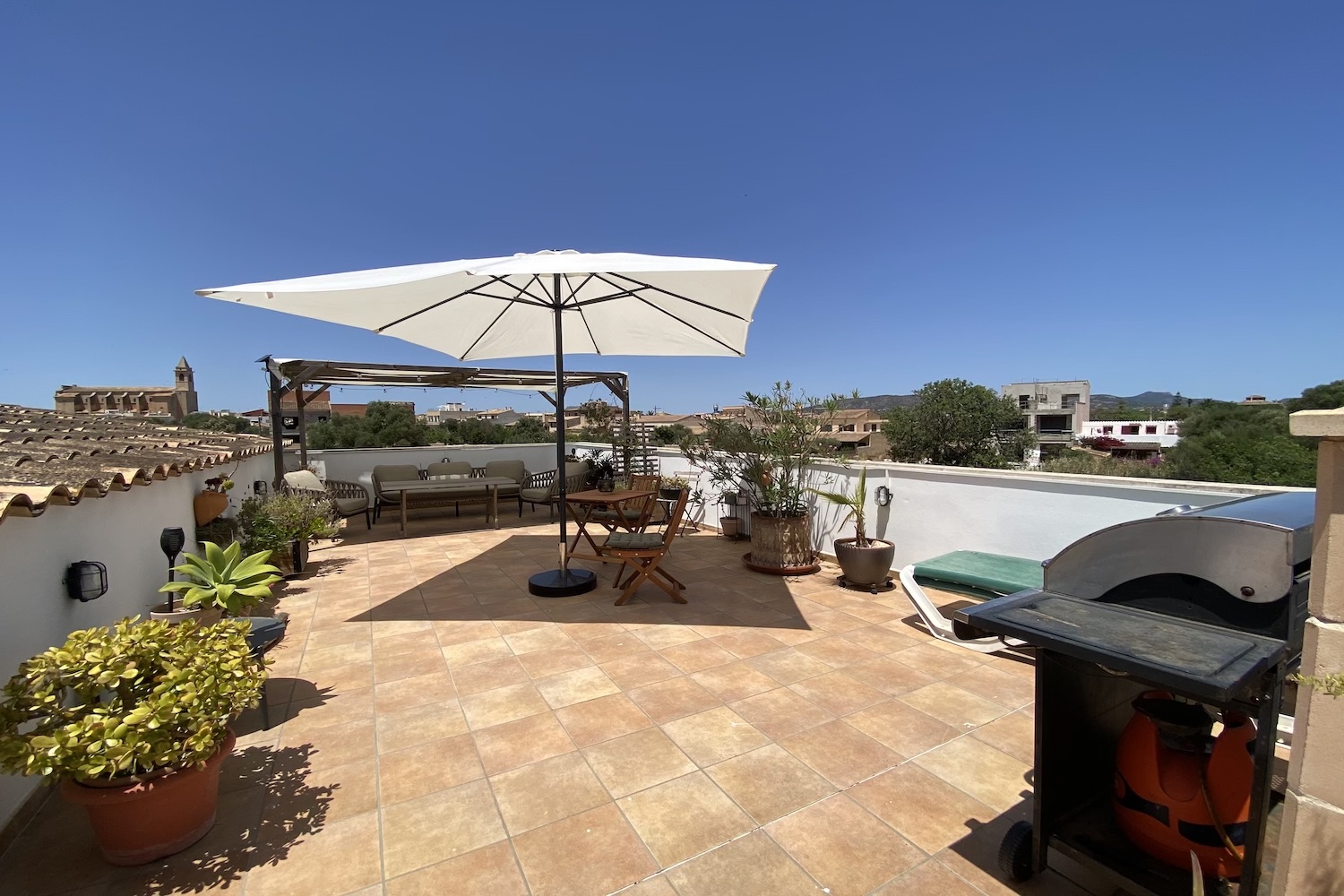 Rooftop terrace with view to the church