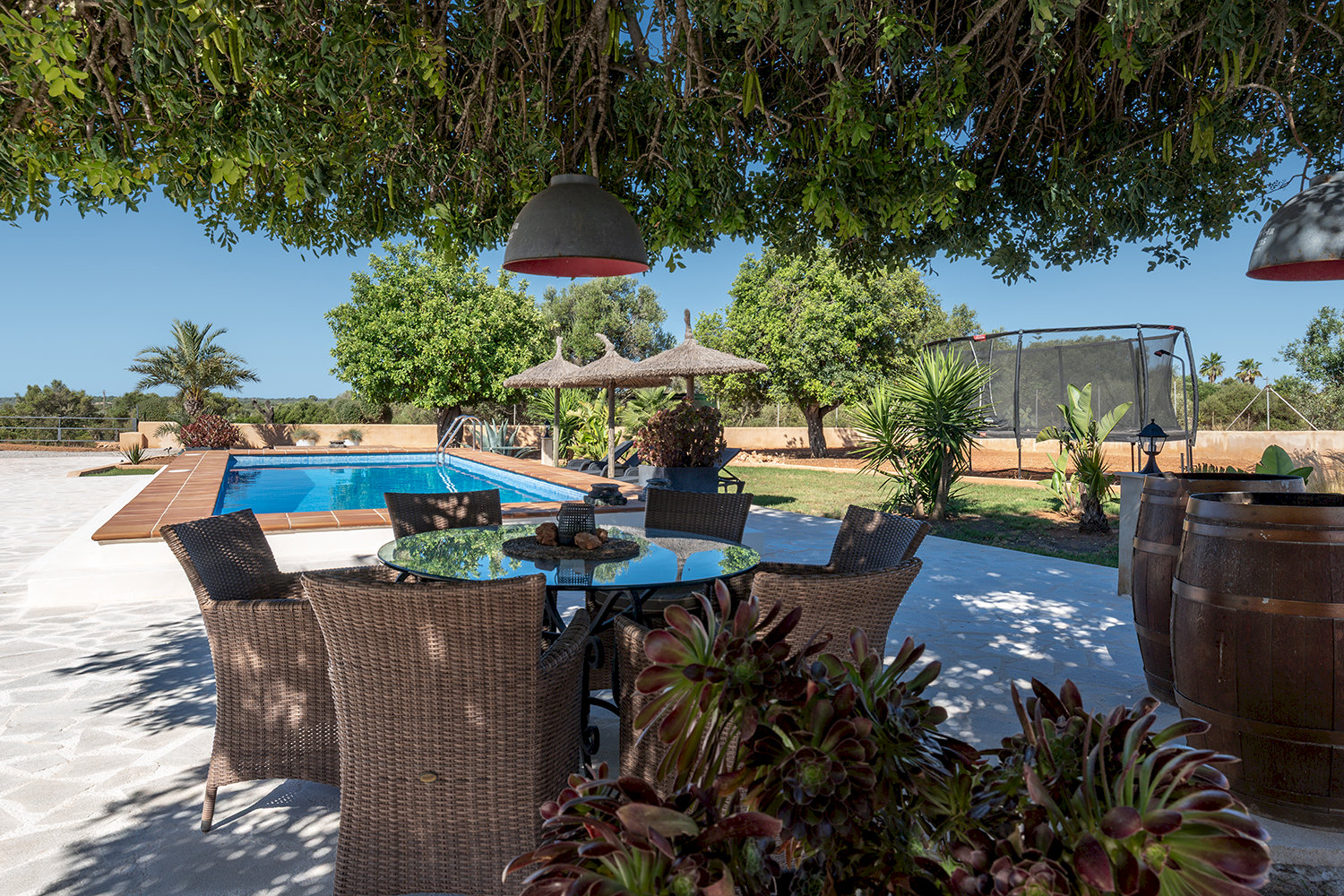 Shaded seating area by the pool