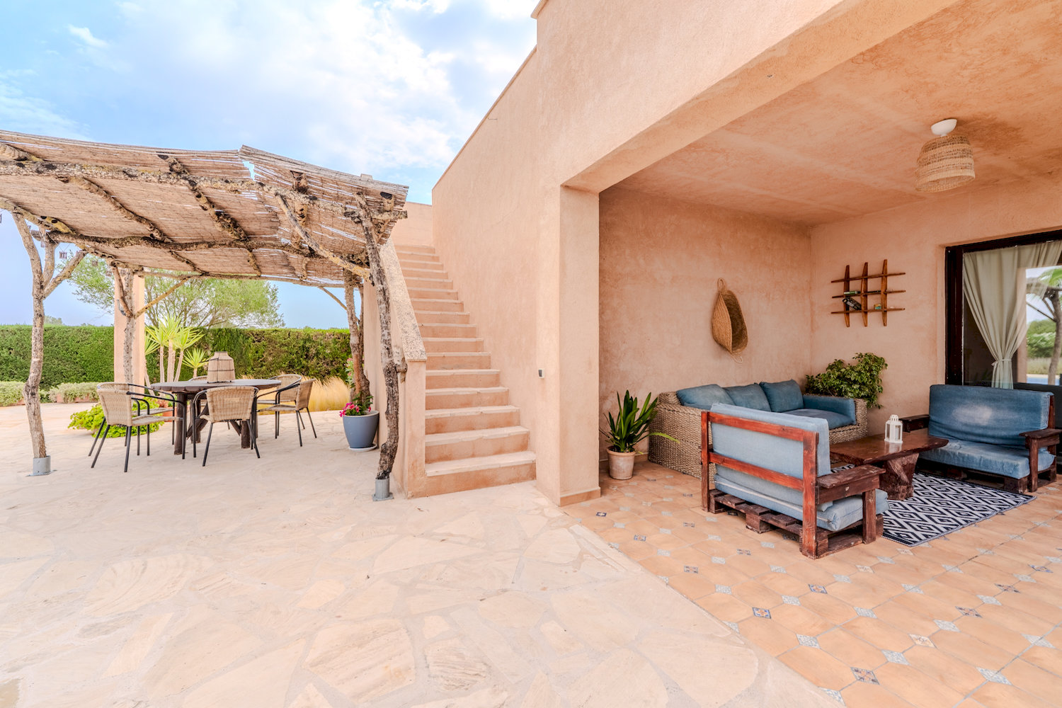 Expansive Covered Terrace with Dining and Lounge Areas