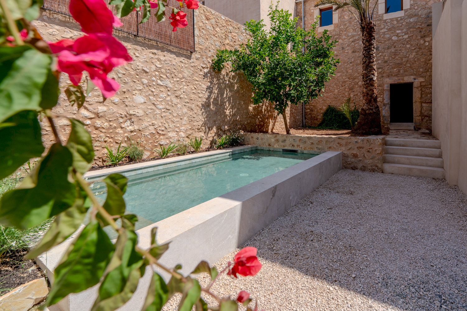 Mediterranean-style patio with pool