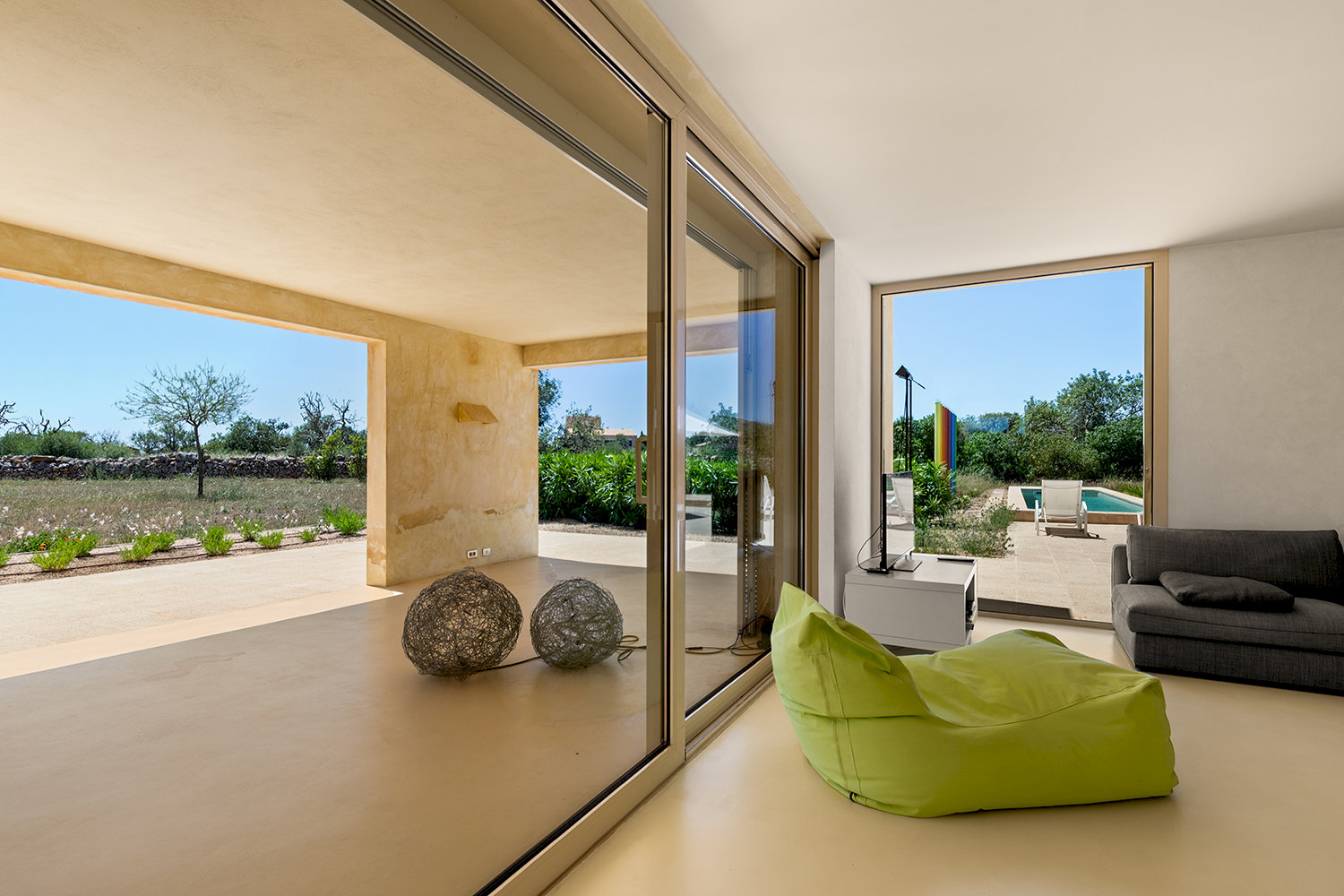Living area with large glass sliding door