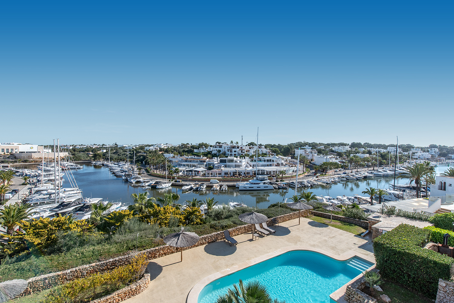 Panoramic view over marina and pool