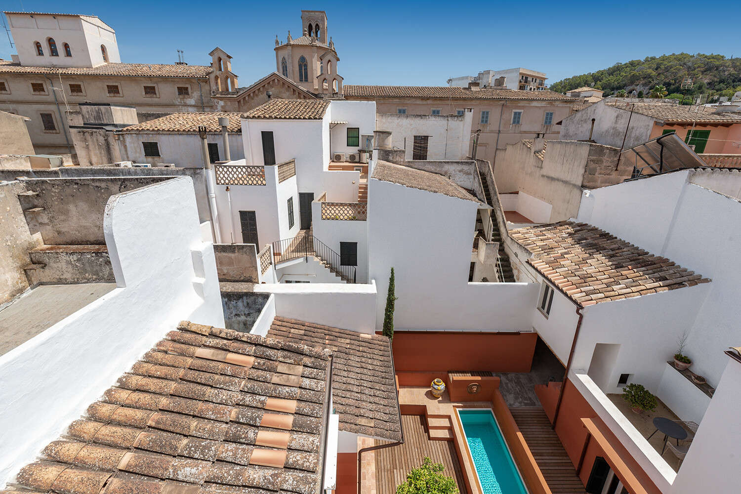 View from the roof terrace across the courtyard and the historic rooftops of Felanitx