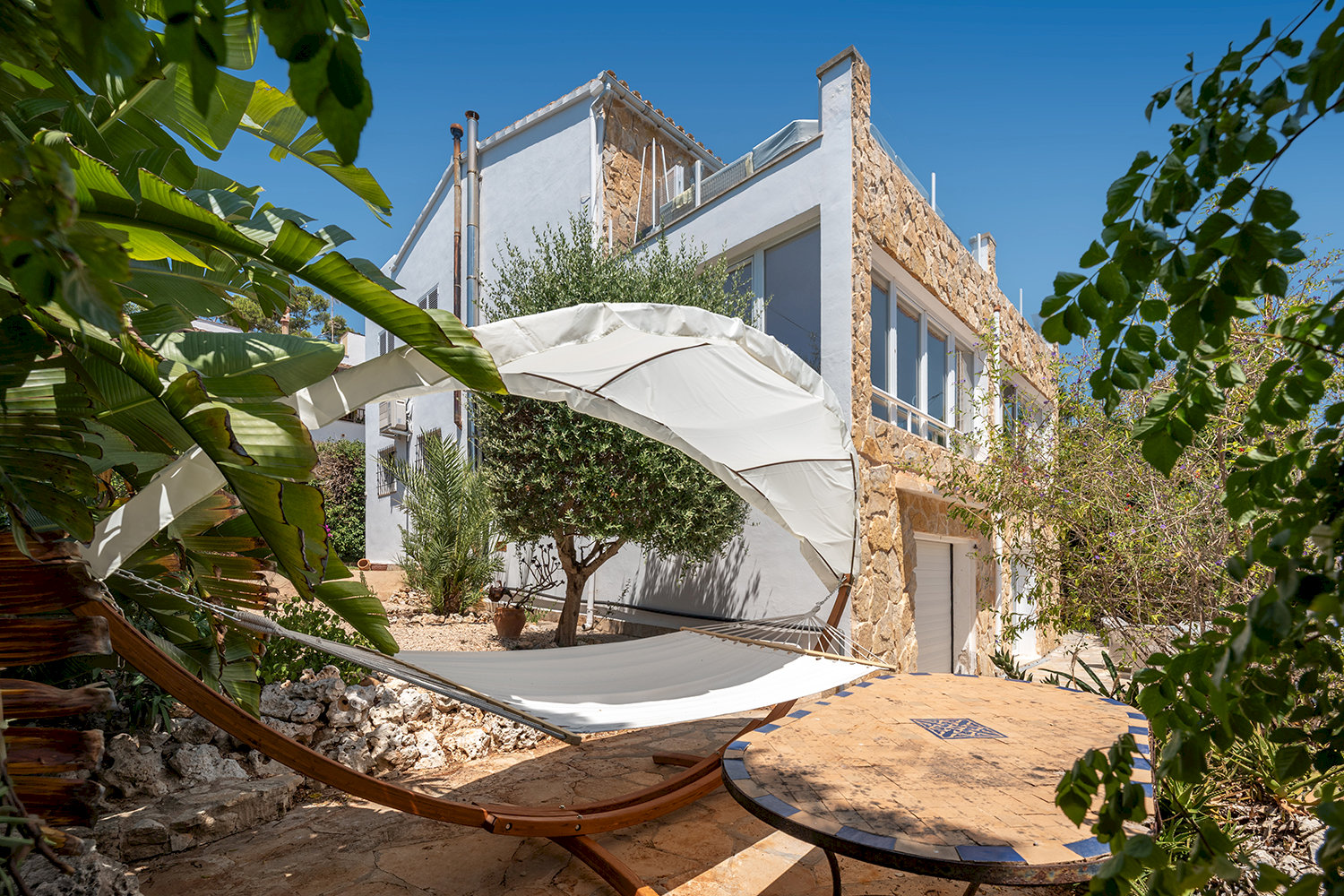Townhouse with terrace, indoor pool and sea views in Portocolom