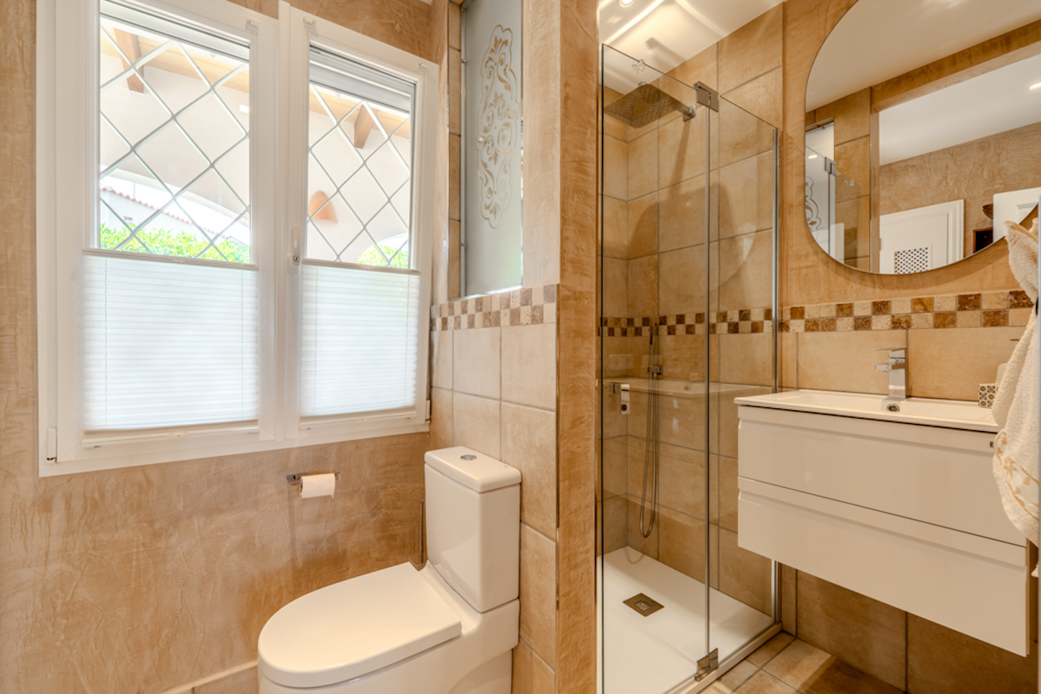 One of 3 bathrooms